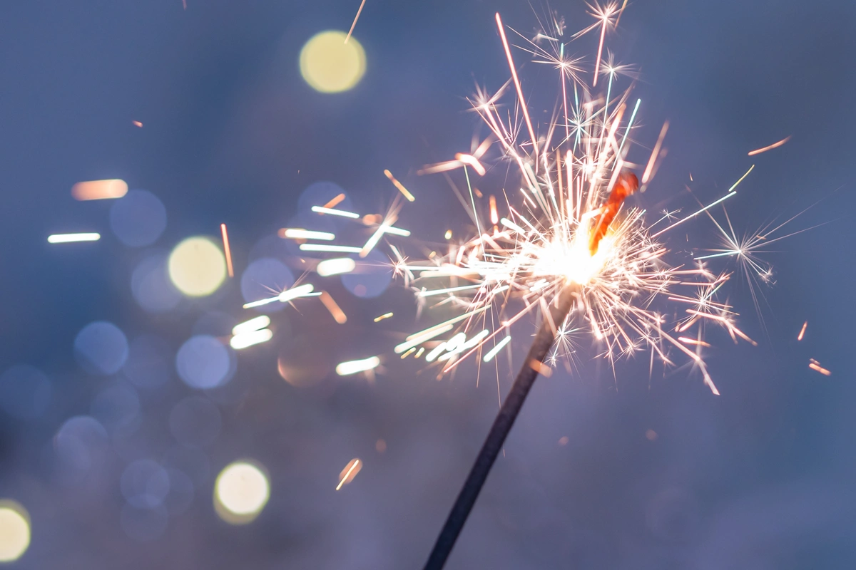 Lit sparkler close-up.
